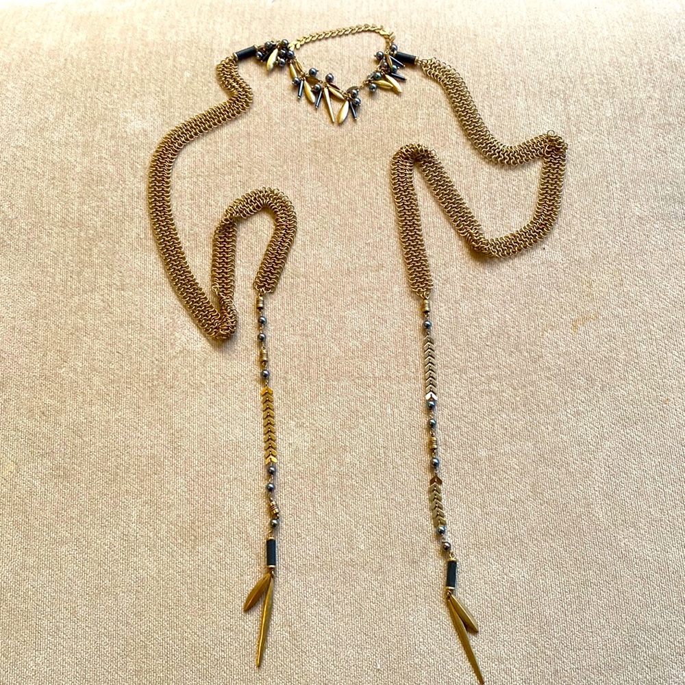 Beautiful wrap around mixed metal necklace.